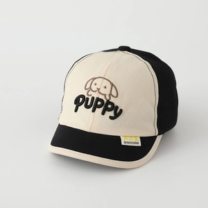 Close-up of the puppy embroidery and contrasting colors on the kids' baseball cap
