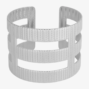 Detailed view of silver 304 stainless steel cuff bracelet with vertical hollow patterns