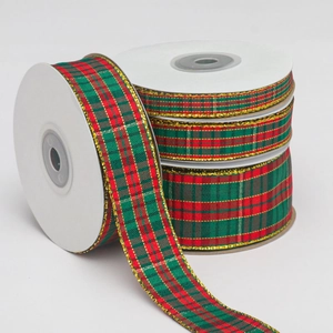 Christmas tartan ribbon with gold edges in red and green for DIY gift wrapping