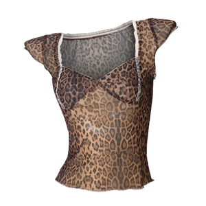 Detail of leopard print mesh top showing translucent fabric and white ruffled neckline