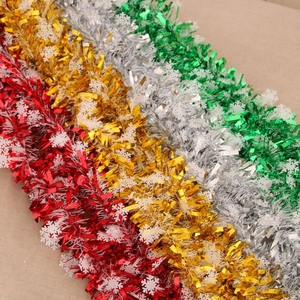 Detail of 180cm Christmas tinsel garlands with white snowflakes in red, gold, and silver