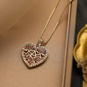 Exquisite 18K gold plated heart pendant necklace with shimmering zircon and red gemstones