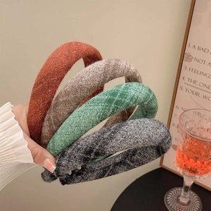 Set of five wide wool fabric headbands in red, brown, green and grey tones