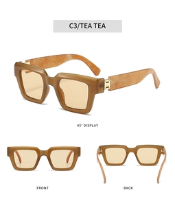 Three-angle product view of square tea-colored sunglasses with marble textured temples