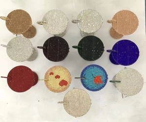 Detailed top view of various round crystal evening clutches with diverse patterns and colors