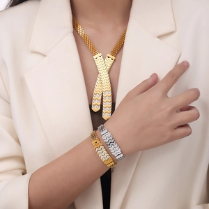 Elegant 18k gold plated stainless steel W-shaped necklace and bracelet set with zircons