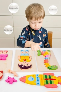 Detail of a young boy playing with a colorful 3D wooden number puzzle with dinosaur shapes