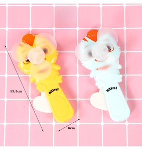 Detail view of cartoon chick hand-press fans showing 13.5cm height and portable design