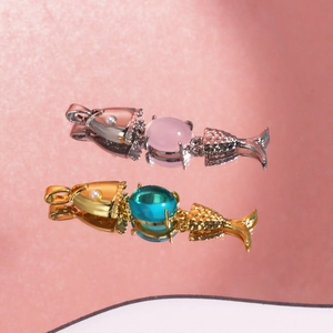 Articulated fish pendants in 18K gold and silver plating with pink and teal gemstones