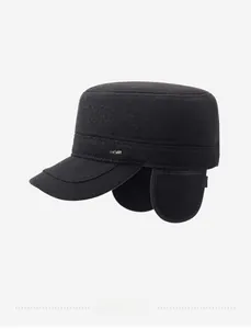 Detail of winter thermal flat cap for men with metal sport badge and wool texture