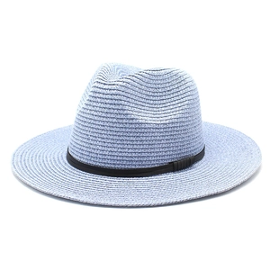 Detailed straw weave texture of light blue Fedora hat with black leather band detail