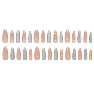 Cat eye almond press-on nails in nude pink and shimmering silver with crystal accents