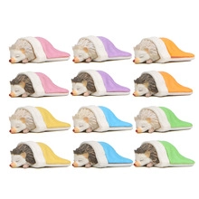 Set of 12 cute resin hedgehog figurines sleeping under colorful blankets in a grid layout
