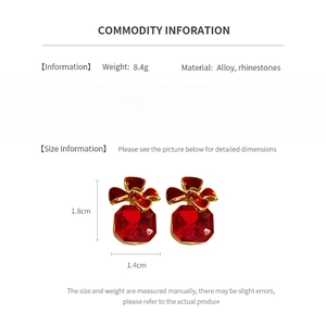 Detailed view of red bow earrings with rhinestones, specifications and dimensions
