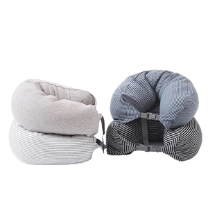 Set of four minimalist U-shaped travel neck pillows with soft knit fabric and buckle straps