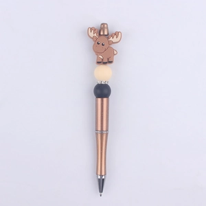Detail of creative beaded pen featuring a cute elk topper and glitter bronze barrel