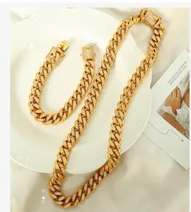 Macro shot of 18k gold plated Cuban link chain set with micro-paved zircon crystals