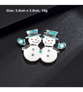 Detail showing two snowmen Christmas brooch size 5.8cm x 3.8cm with colorful rhinestones