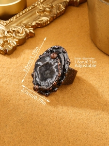 Vintage bronze adjustable ring with natural black geode agate stone in 45-degree view