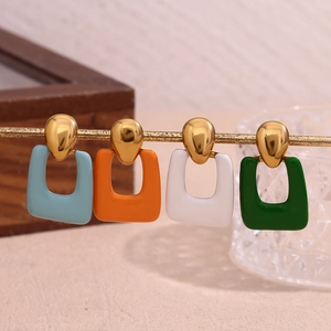 Detail of colorful enamel geometric rectangular earrings in gold stainless steel finish