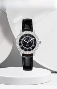 Close-up of IBSO watch with crystal bezel, moon-star dial, and blue sapphire crown