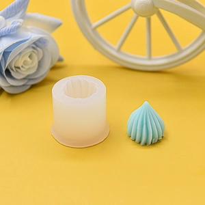 DIY silicone mold for geometric candles showing translucent tool and blue spiral finished product