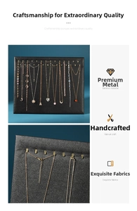 Detail view of black jewelry display board with golden metal hooks for necklaces
