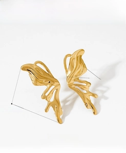 Detailed view of gold butterfly earrings with dimensions 47mm height and 15mm width