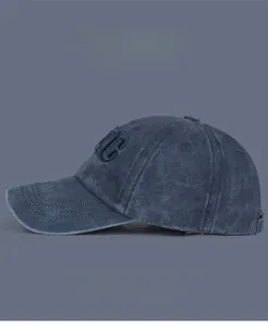 Detail of NYC embroidery on vintage washed cotton baseball cap with multi-color options