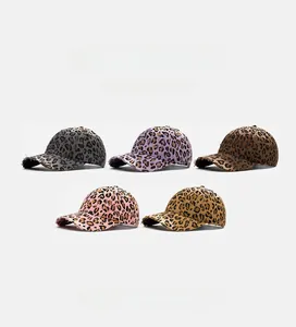 Close-up of leopard print baseball caps with vintage distressed torn edges in five colors