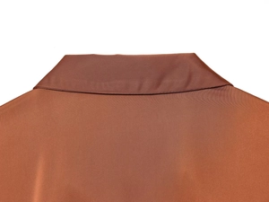 Detailed close-up of brown satin shirt collar showing smooth texture and stitching