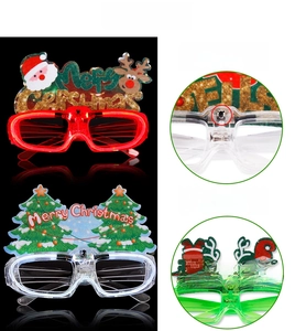 Macro shot of LED festive glasses featuring adjustable control switch and internal light bulb
