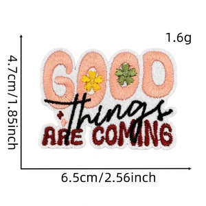 Detail view of colorful Good Things Are Coming embroidery patch with 6.5cm size markings