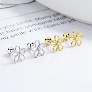Detailed macro of S925 sterling silver flower stud earrings with zircon and screw back