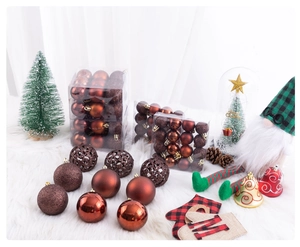 Close-up of bronze and brown Christmas ball ornaments set with hollow and glitter details