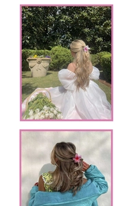 Detail of large gradient pink hibiscus hair claw clip showing floral texture and stamen