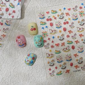 Detailed 3D relief nail stickers featuring pastel carousels, fireworks and bows