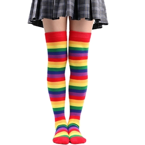 Detailed close-up of colorful rainbow striped over-knee high socks for cosplay