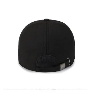 Detail view of the black winter baseball cap back with adjustable metal buckle and strap