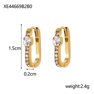 Elegant gold titanium steel U-shaped earrings with white cubic zirconia crystals
