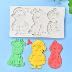 Christmas silicone mold featuring Santa, snowman, and reindeer shapes for cake decorating