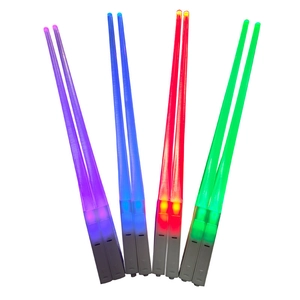 Set of 4 pairs of LED glowing chopsticks in purple, blue, red, and green lights