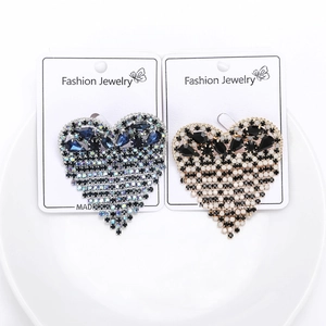 Elegant heart-shaped tassel brooches with rhinestones in navy blue and checkerboard patterns