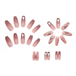 Pink gradient press-on nails with glitter, rhinestones and water drop charms