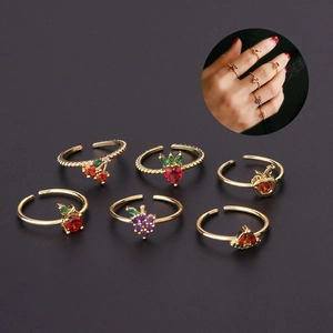 Adjustable gold fruit ring set with colorful zircons featuring apple and cherry motifs