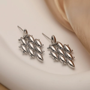 Geometric S925 sterling silver stud earrings with polished olive-shaped metal clusters