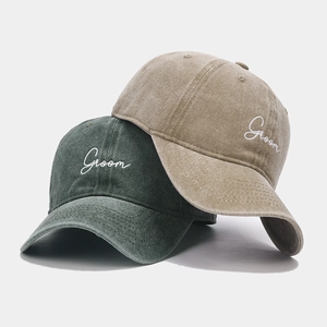Vintage washed cotton baseball caps in dark green and khaki with Groom embroidery detail