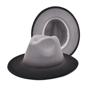 Close-up of gradient wool fedora hat showing grey to black transition and felt texture