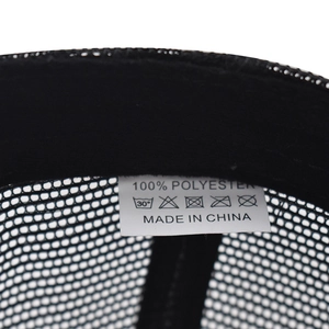 Detailed close-up of interior washing label and black mesh lining of the baseball cap