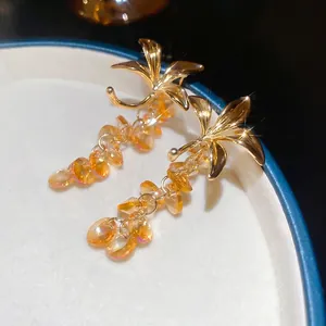 Boucles d'oreilles fleurs vintage françaises avec cristaux champagne en or